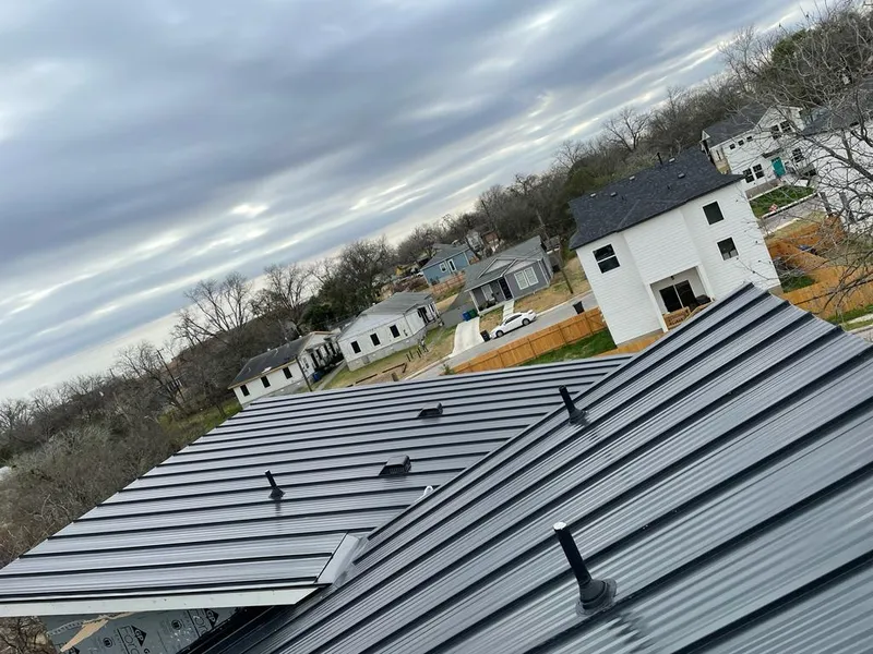 Standing seam metal roof panels with vents for Skylight Repair in Shallotte